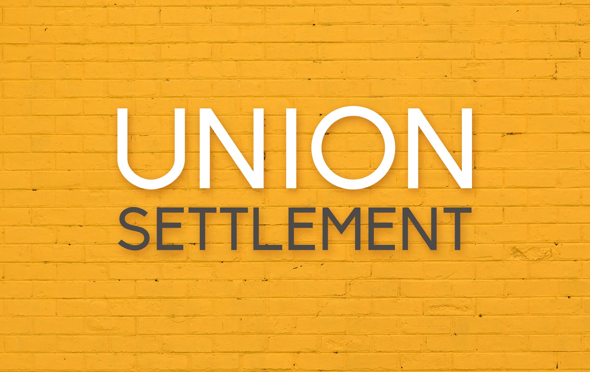 Union Settlement logo against brick background